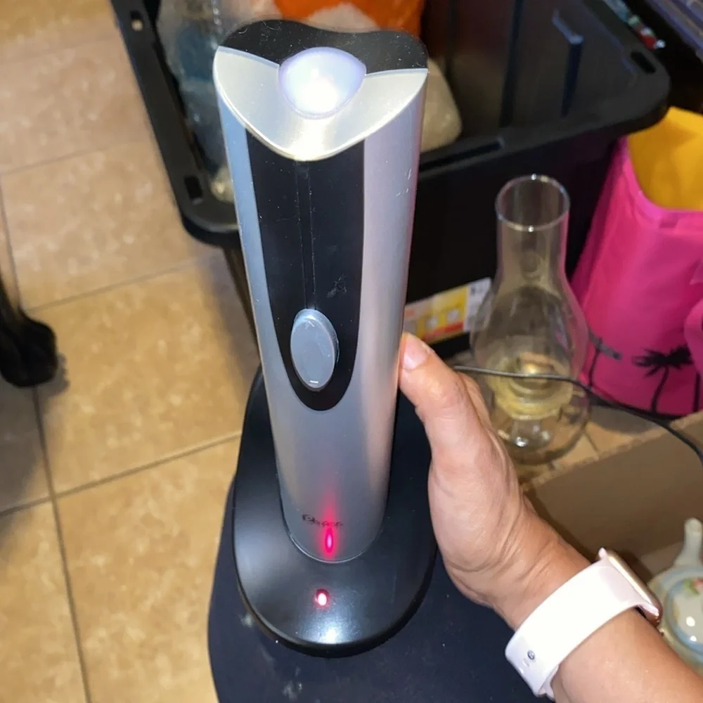 Bx47 Oster electric wine opener works fine